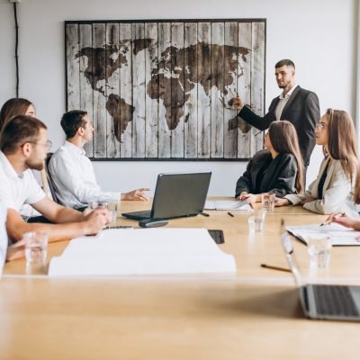 Group of people working out business plan in an office